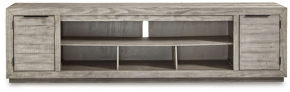 Naydell - XL TV Stand w/Fireplace Option - Gray